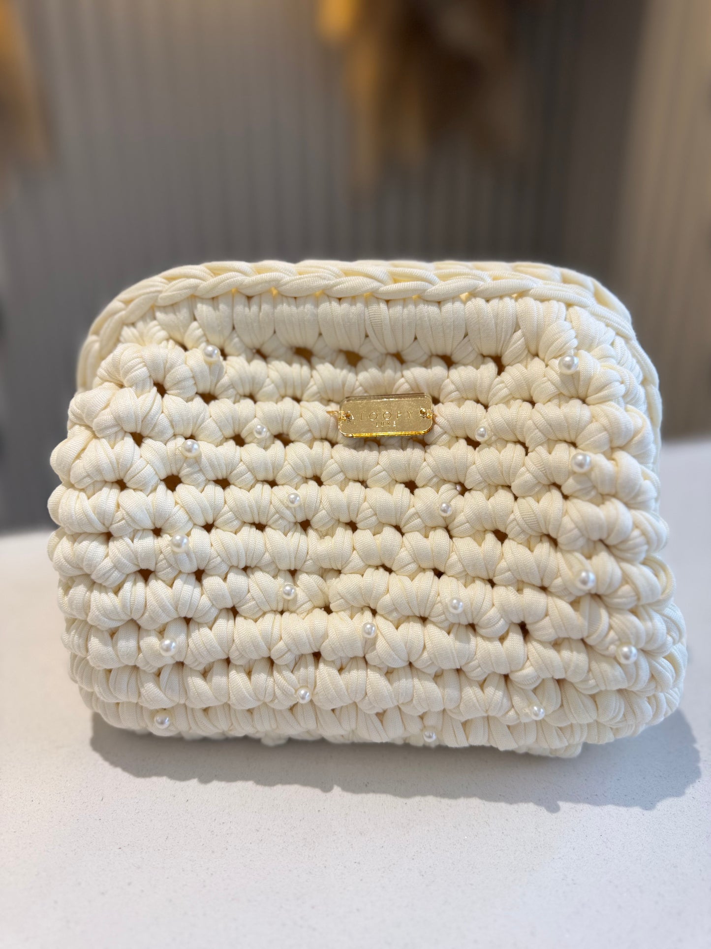 Loopy Luxe Small Pearly Clutch Bag